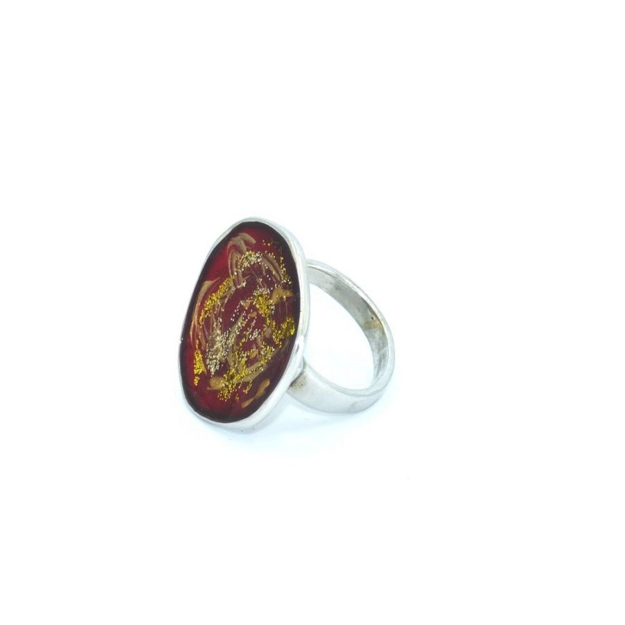silver ring with wet glass